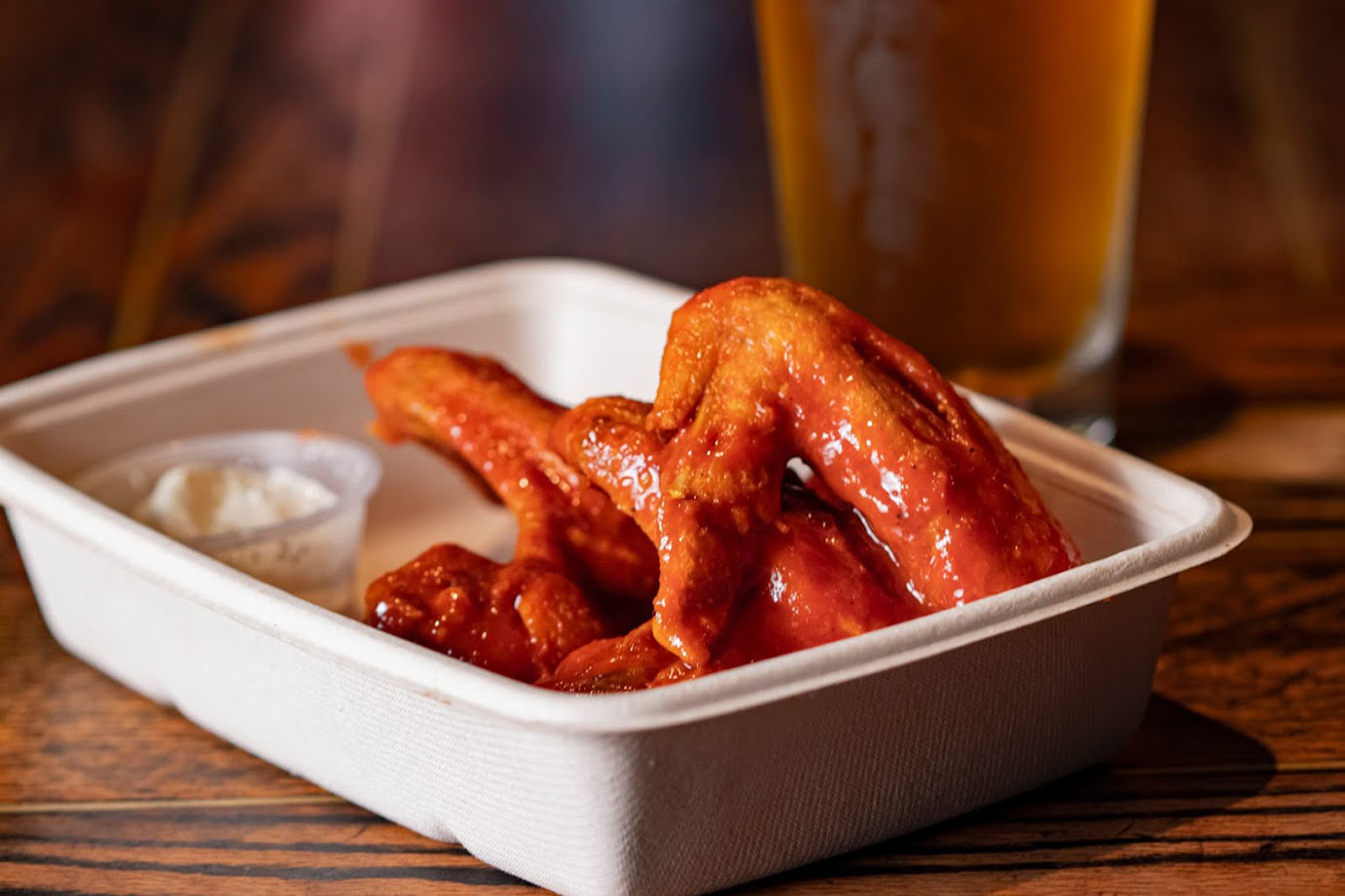 Fried chicken wings with beer